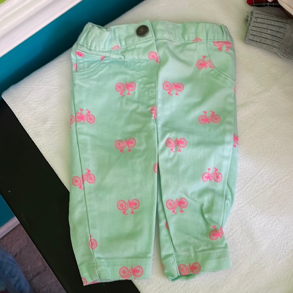 Carter’s 3 mos. Mint green snap waist jeans with pink bicycles. Faux pockets